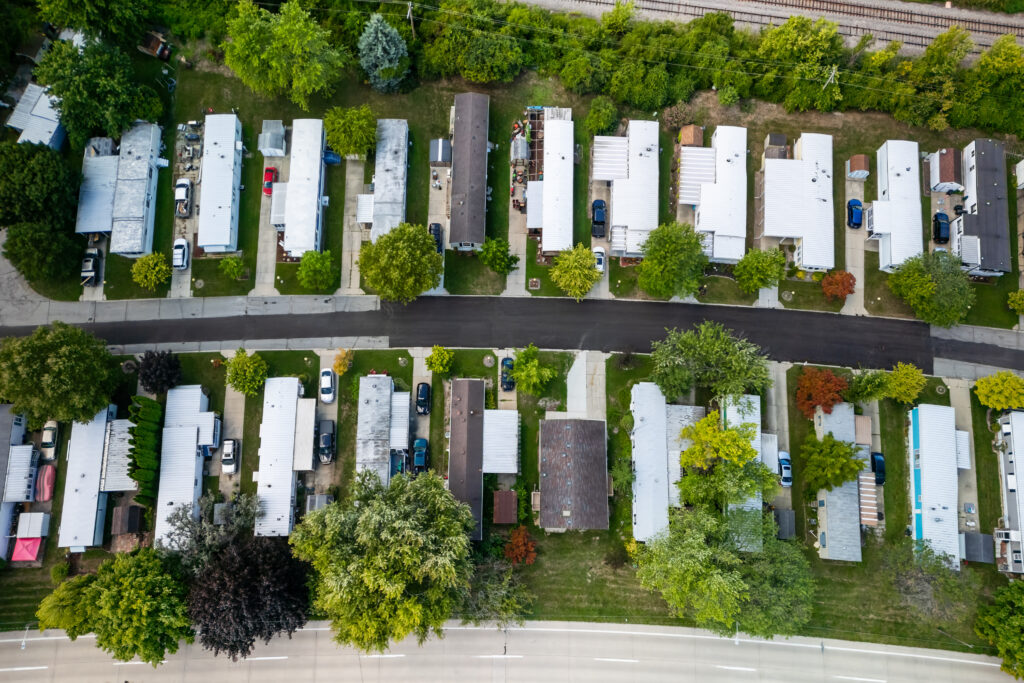 Aerial photo of row mobile homes in trailer park neighborhood in Michigan.
