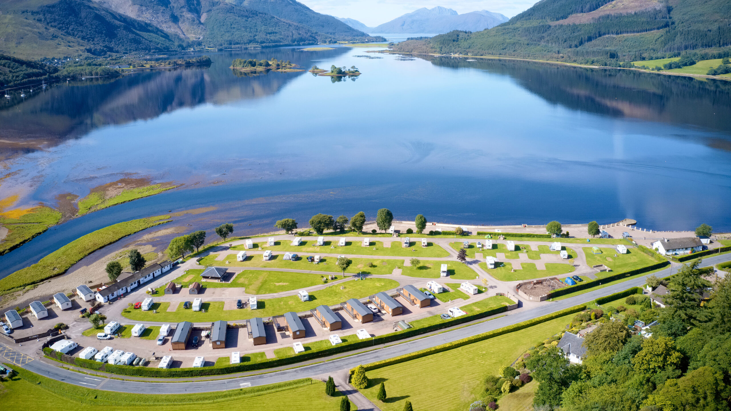 Caravan camping park site in Invercoe near Glencoe aerial birdseye view in the Highlands Scotland