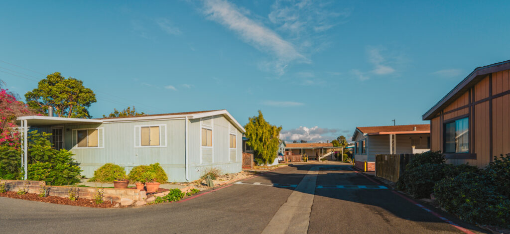 Mobile home park, age-restricted (55+) community in small beach town in California. Architecture, street view